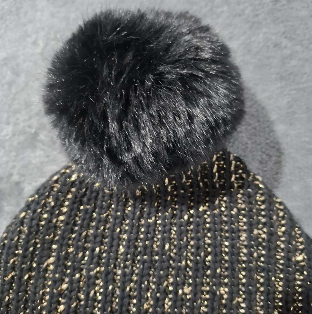 Love Your Melon Harry Potter Snitch Black Metallic Gold Pom Beanie